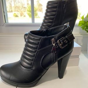 Guess boots. Black booties with 4 inch heel.